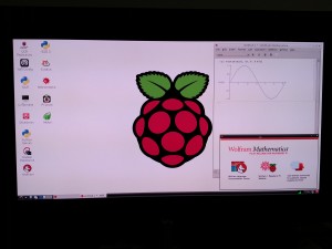 Raspberry Pi booted and running in GUI mode showing a Mathematica plot of Sin[x]